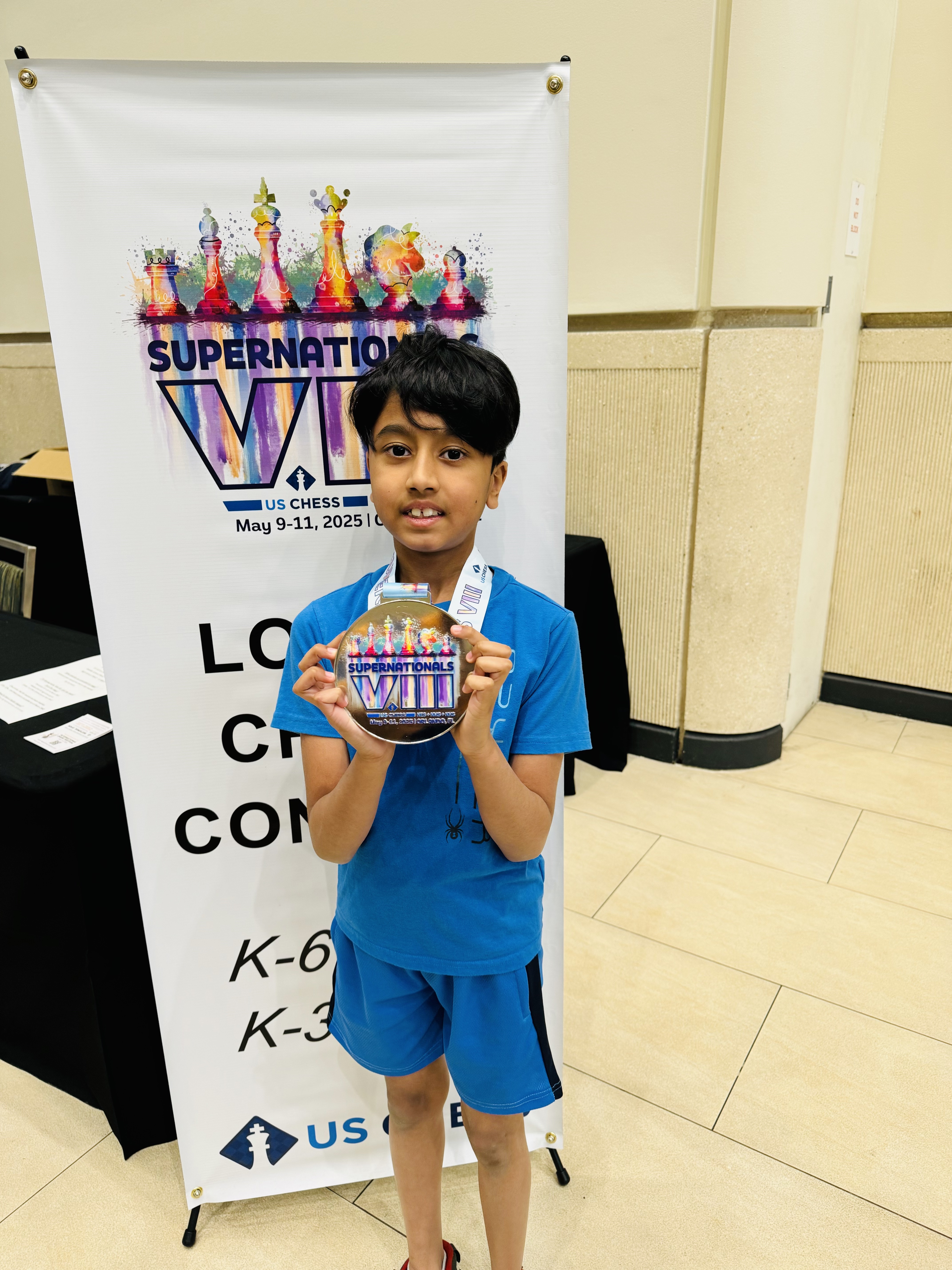 aadvik with medal