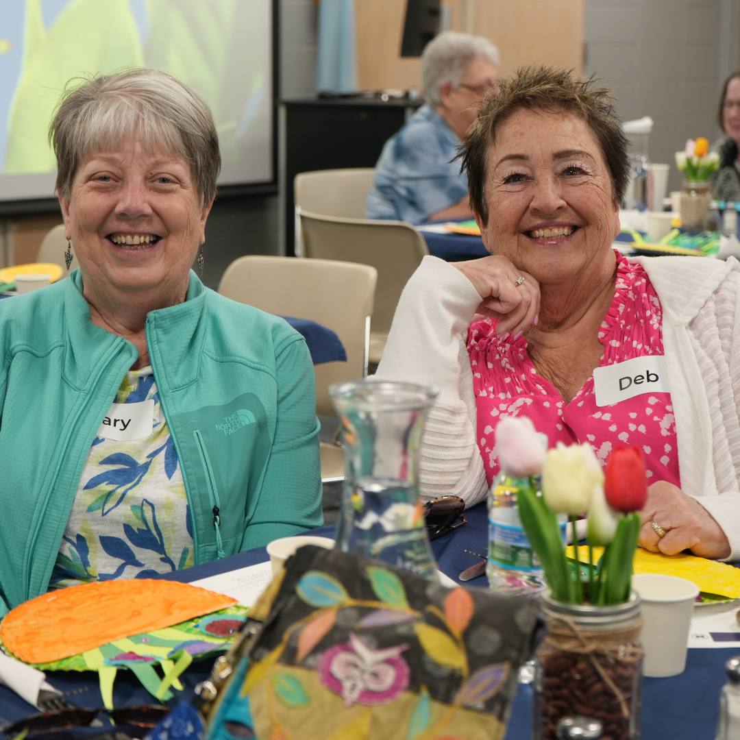 Two community members at community lunch