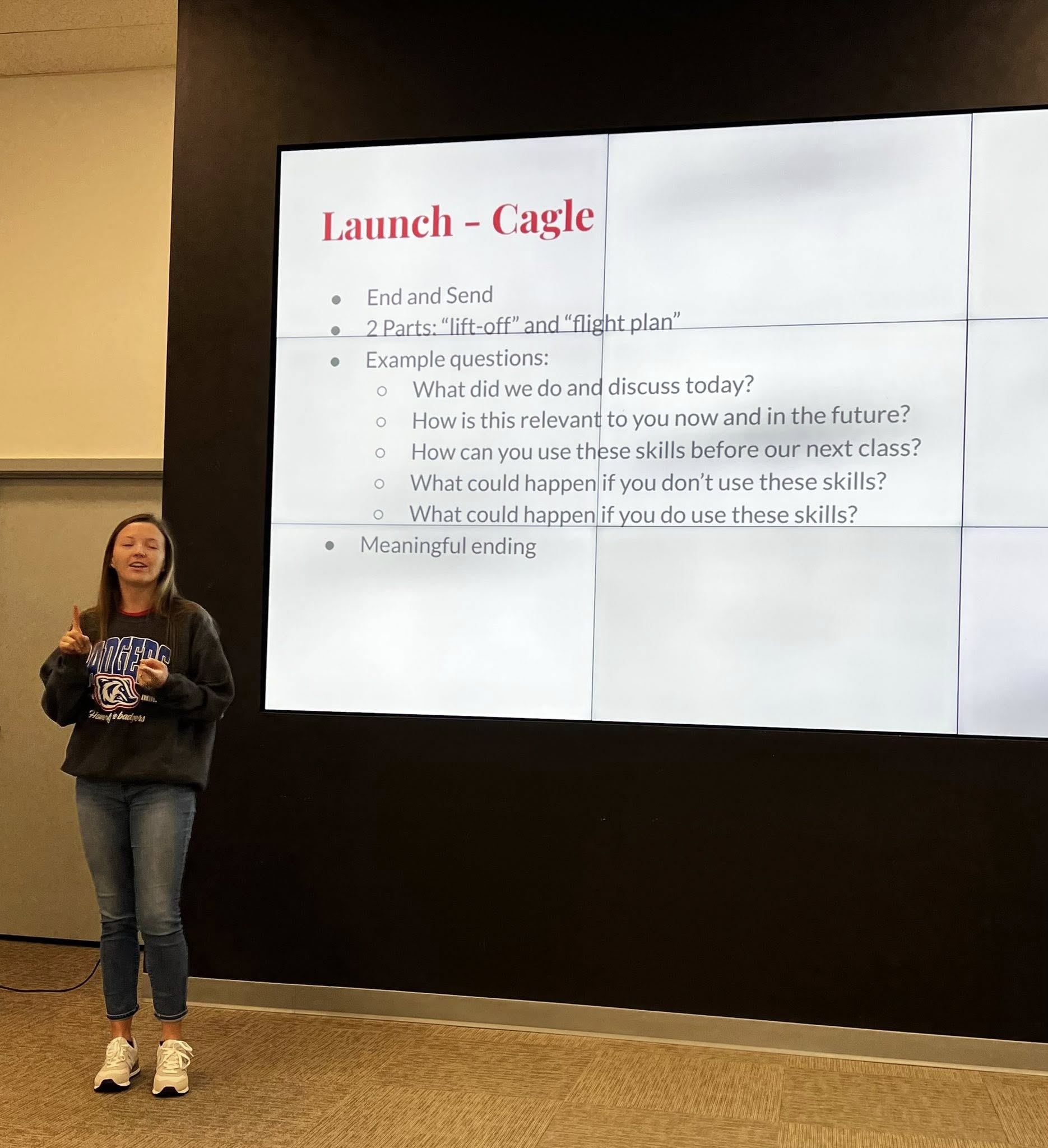 student giving a hi five