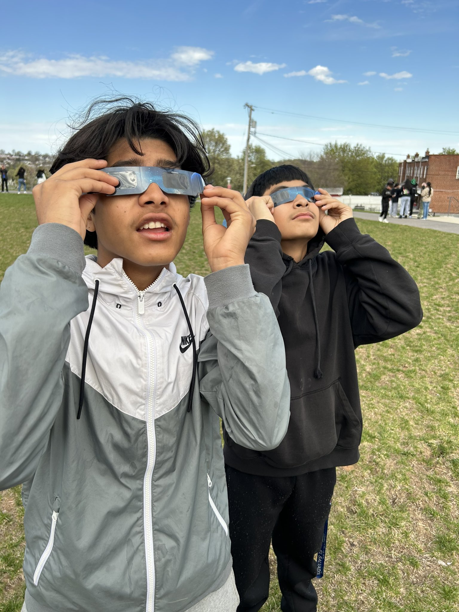 students watching eclipse