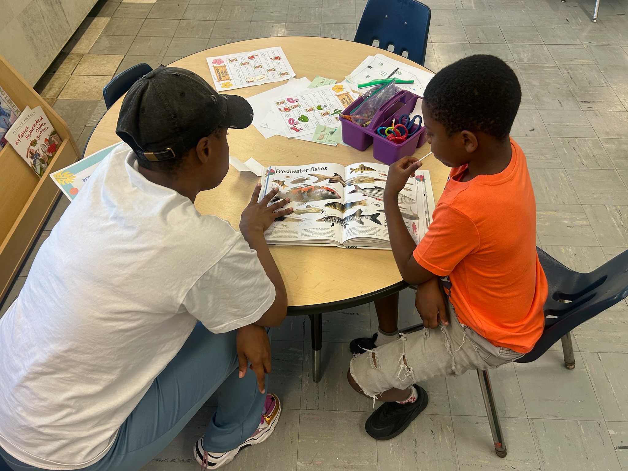 Adult reading to child