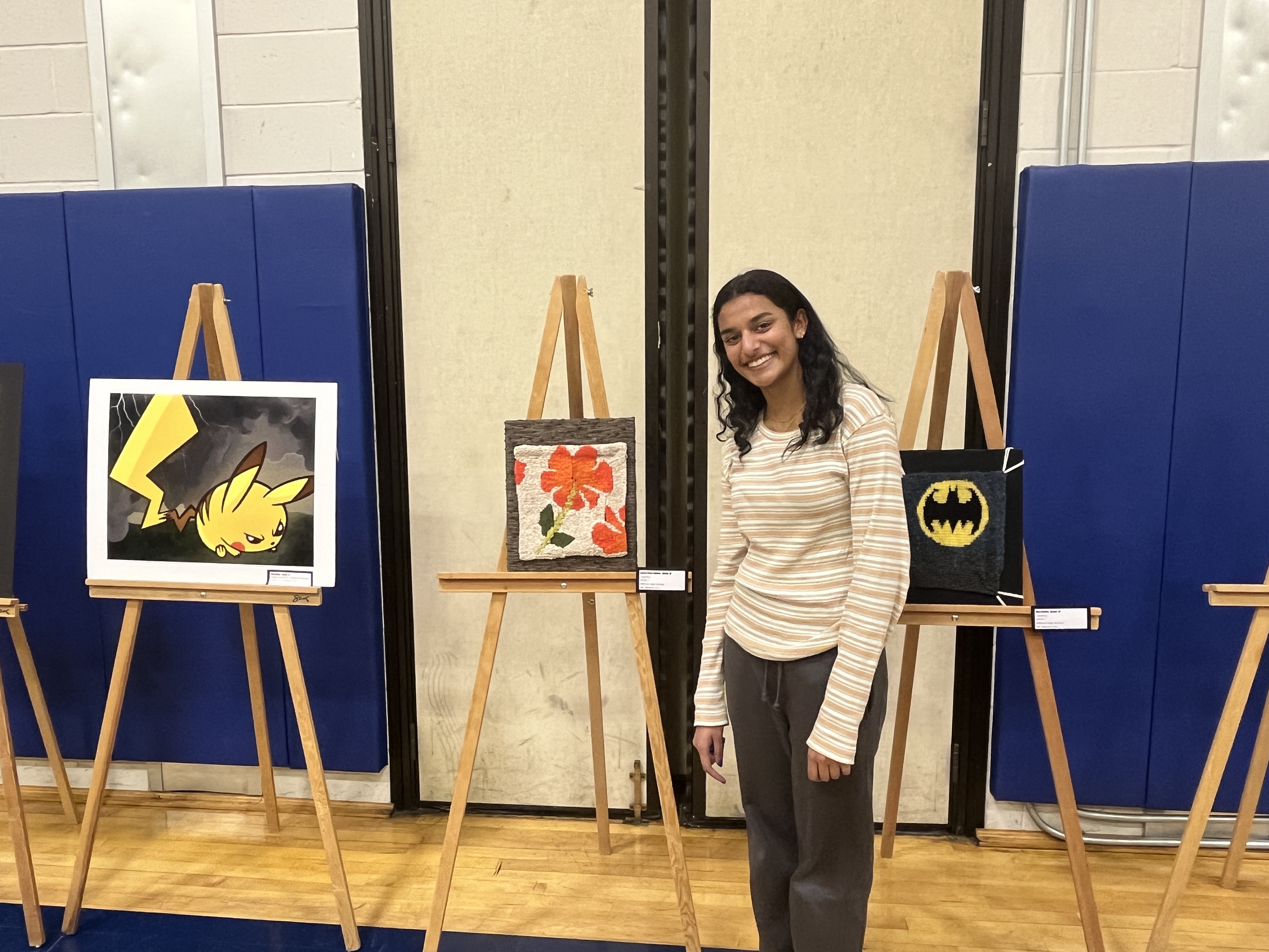 student with her art
