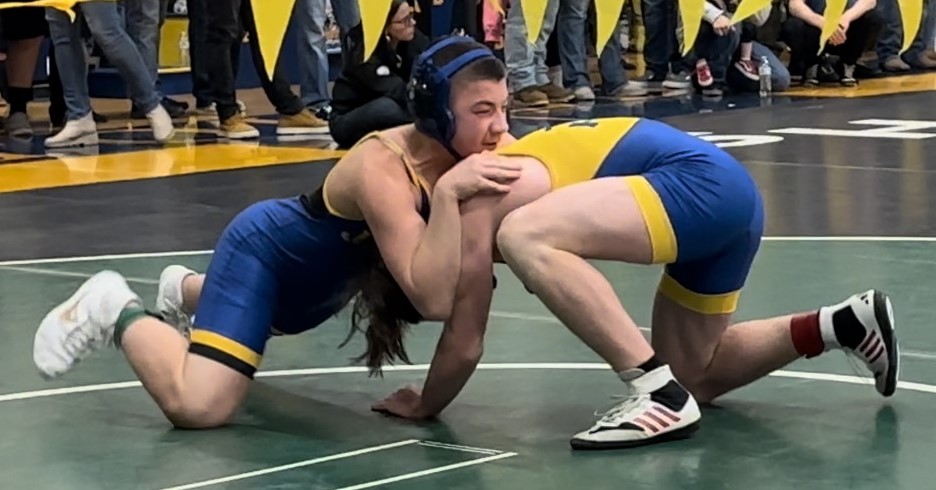 two students wrestling
