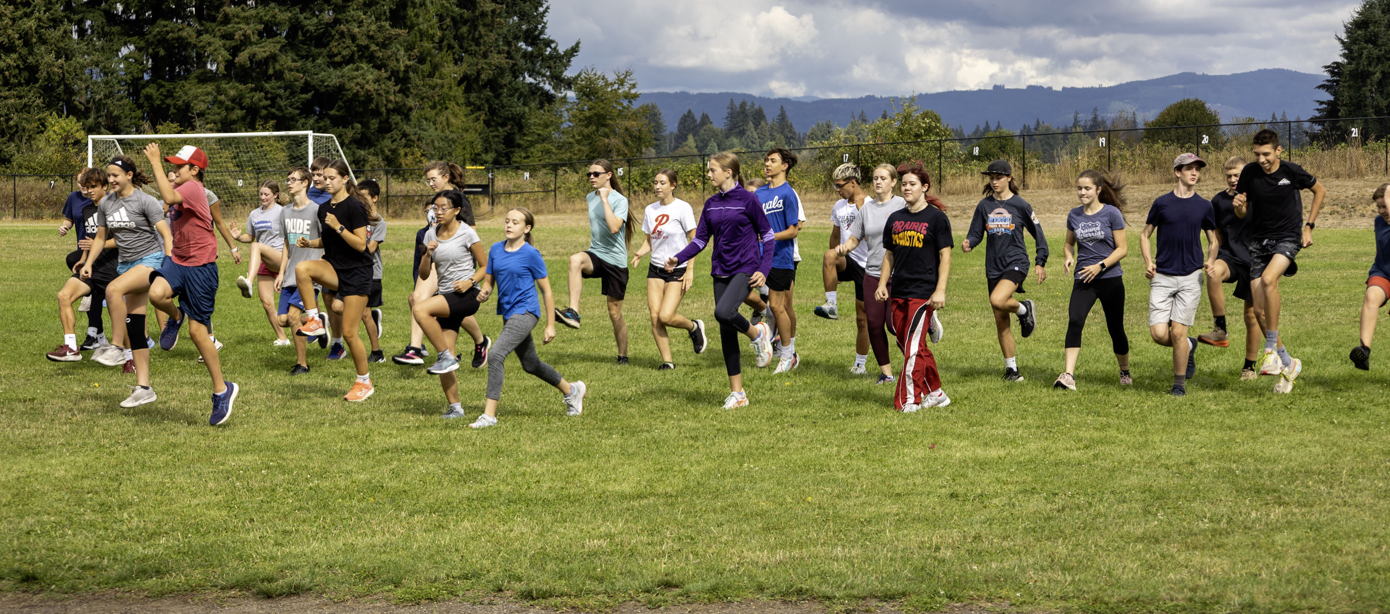 Laurin Middle School cross country practices with members of the Prairie High School team