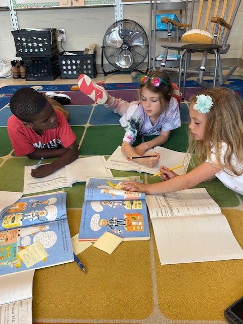 Students working in text