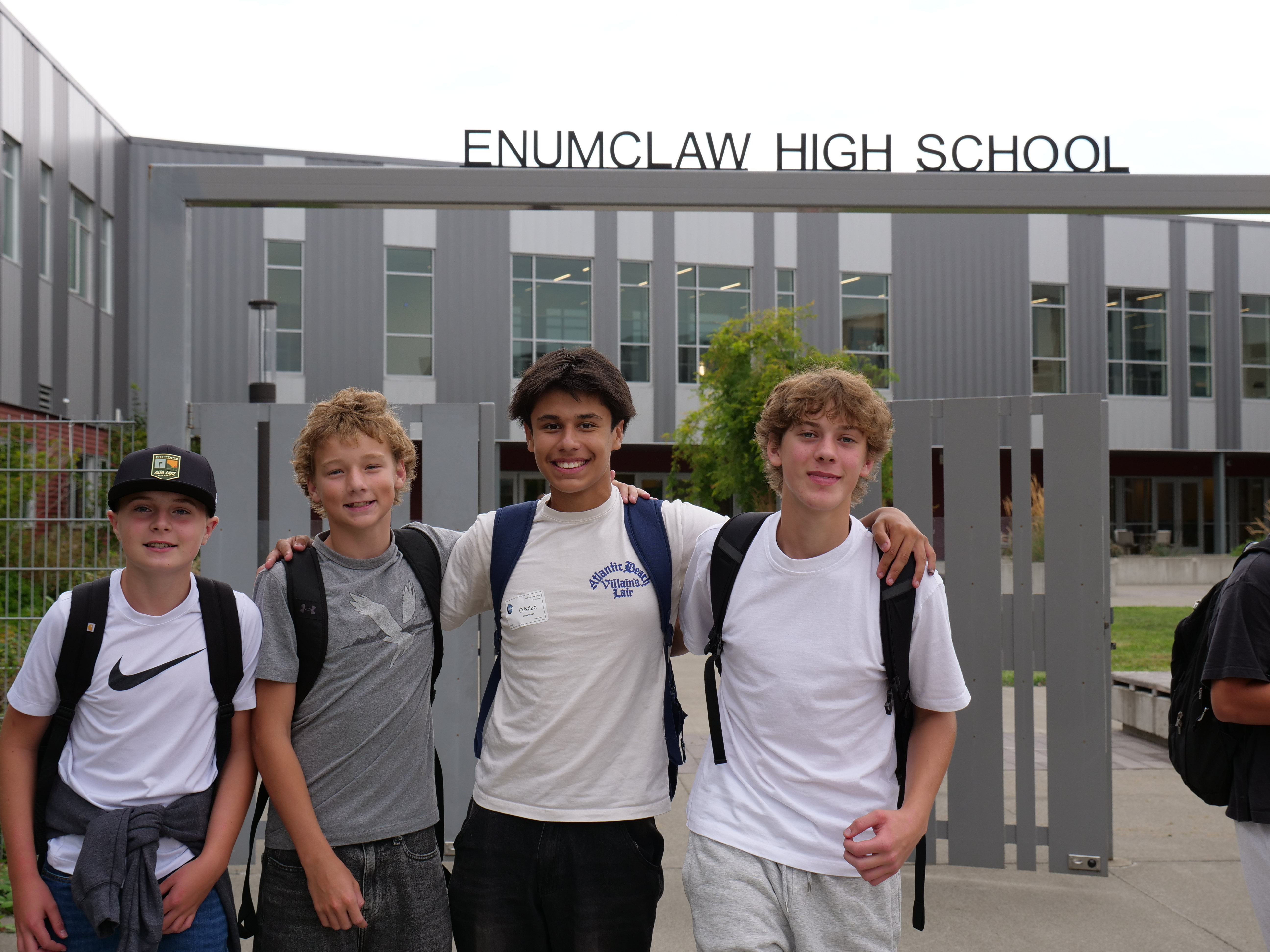 HIgh School Students posing outside of school