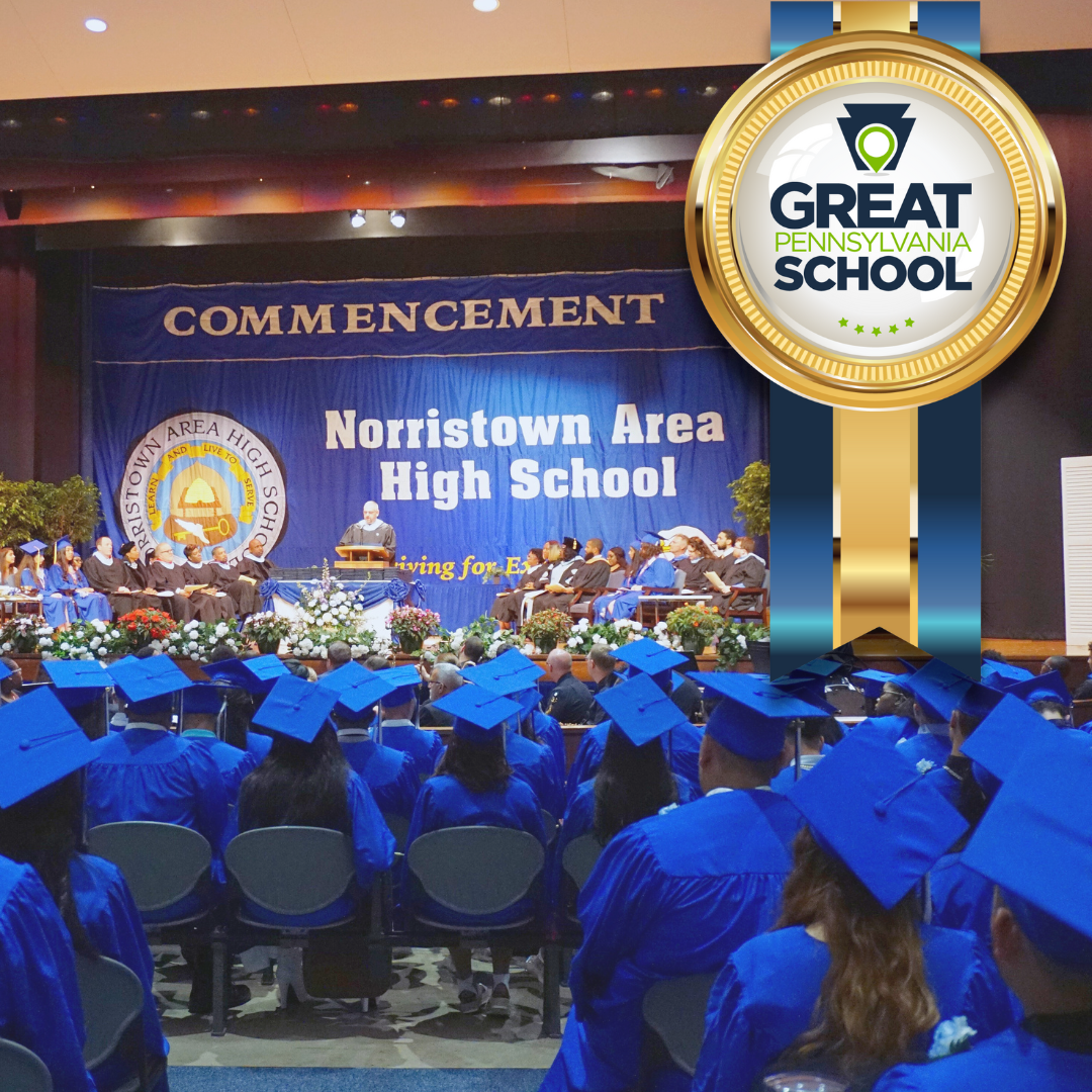 Auditorium filled with graduated with Great PA School Ribbon overlayed