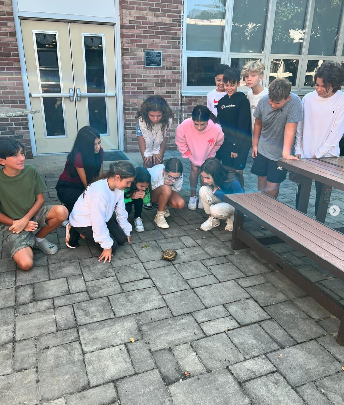 6th graders love bringing Pablo to the courtyard.