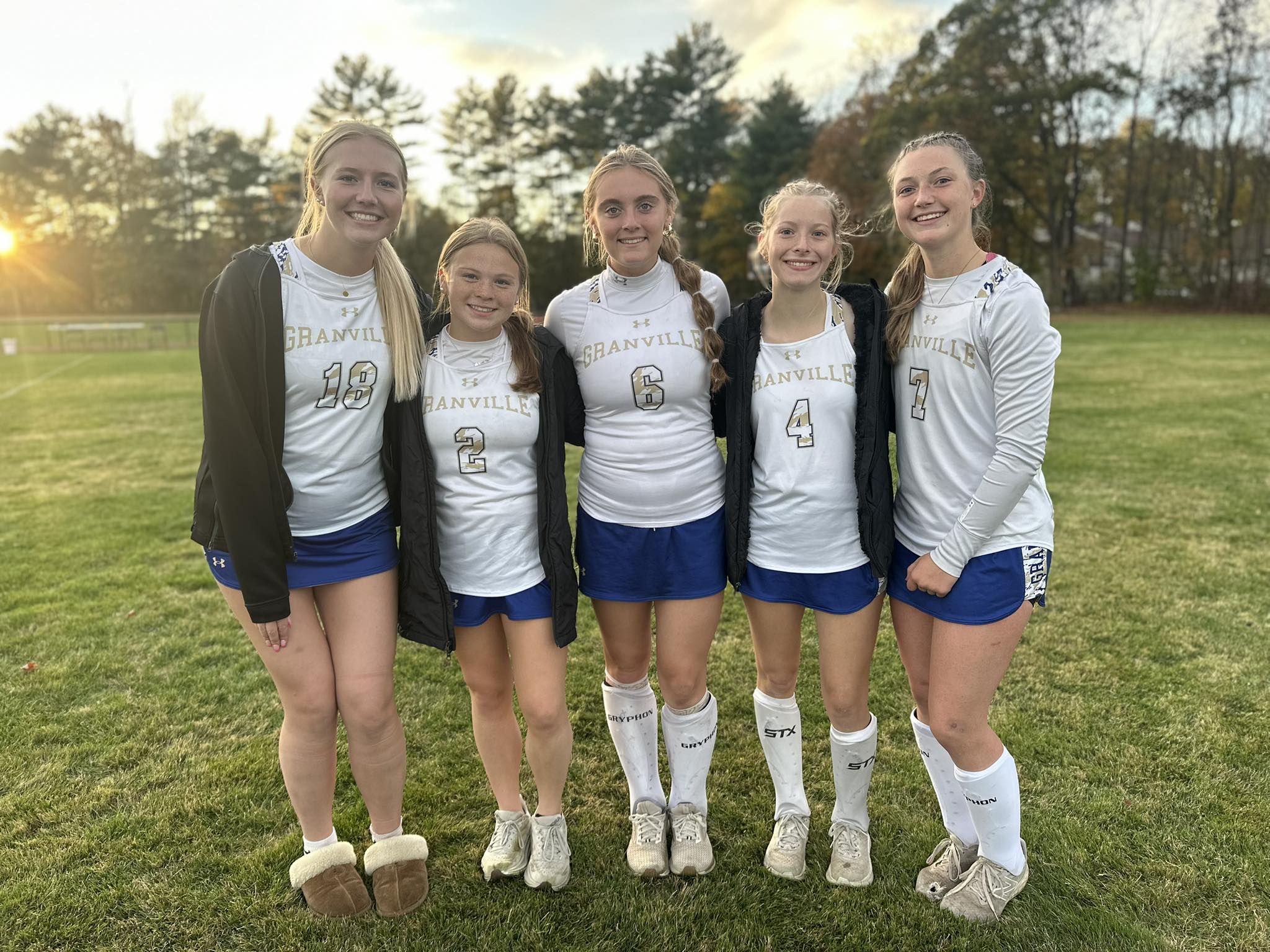 Senior Field Hockey Ladies - 5 Players with arms around each other