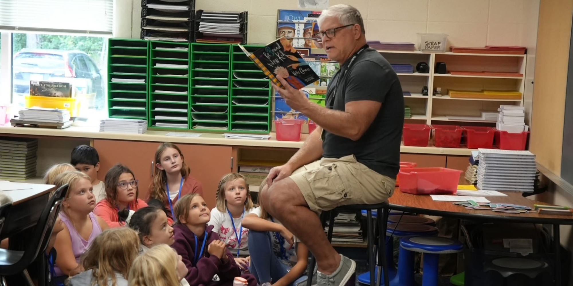 Teacher with students