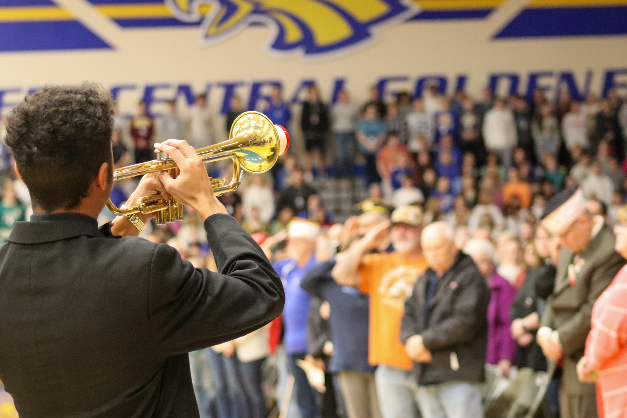 CHS student playing taps