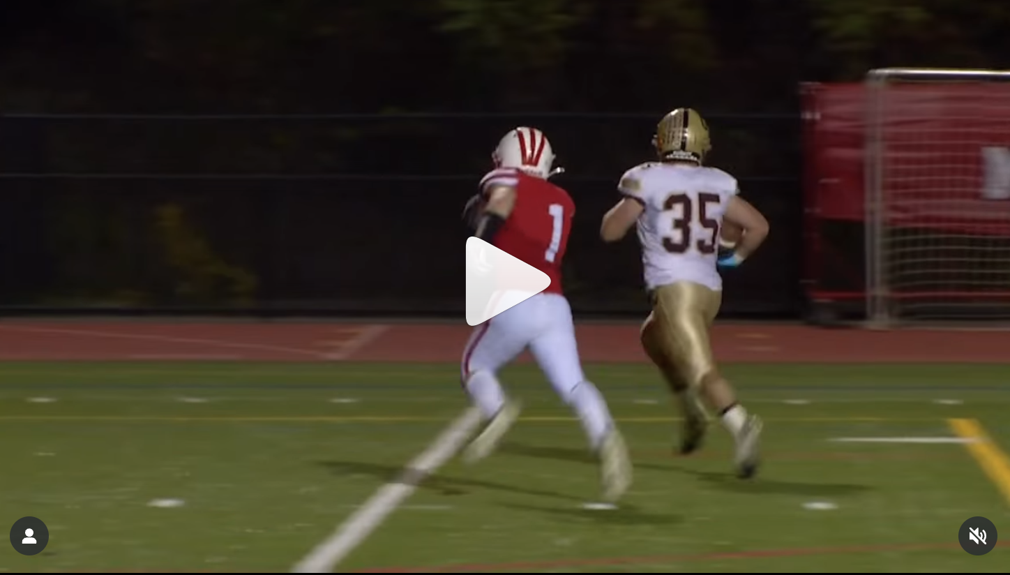 Chad Monty #35 of the GW Team heads for a touchdown