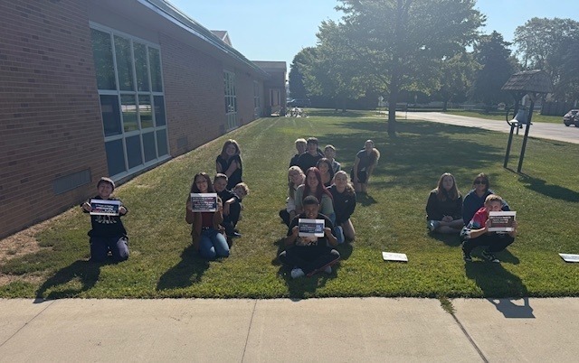 Students showing their "why study history?" responses. 