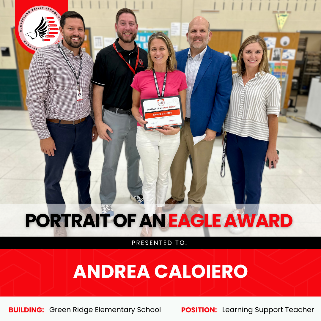 Group picture with Andrea Caloiero receiving a Portrait of an Eagle Award at Green Ridge Elementary.