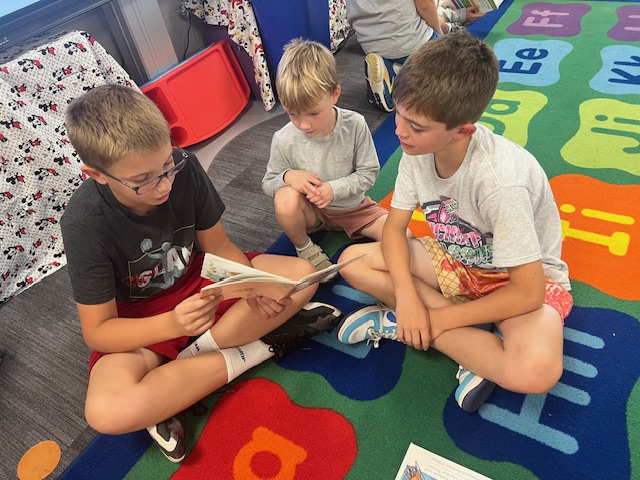 Mrs. Robinson's Class met with their kinder buddies (Ms. Reiter's class) on Friday for some reading time.