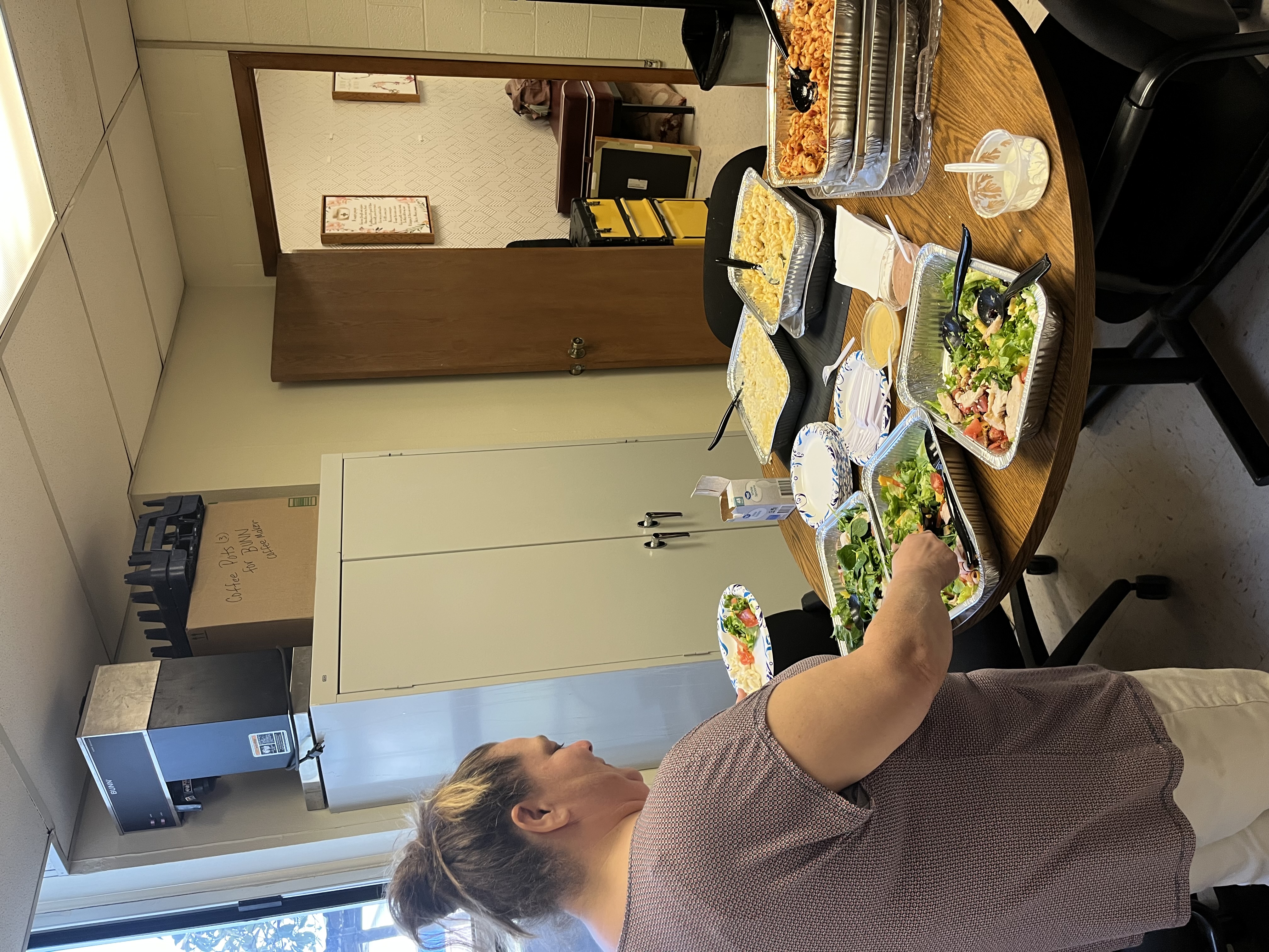 Teacher getting salad for lunch