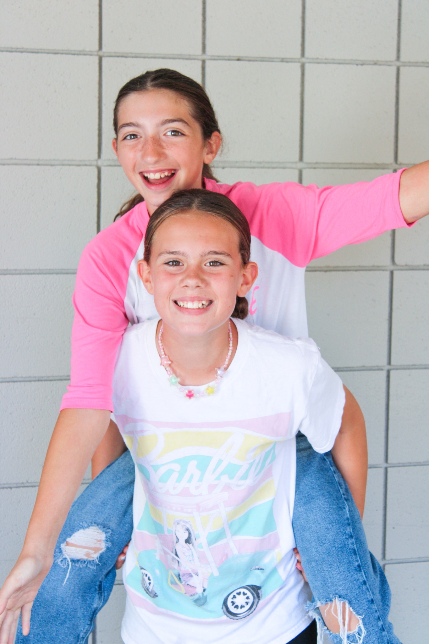 Two students posing on Ken and Barbie themed day at EMS