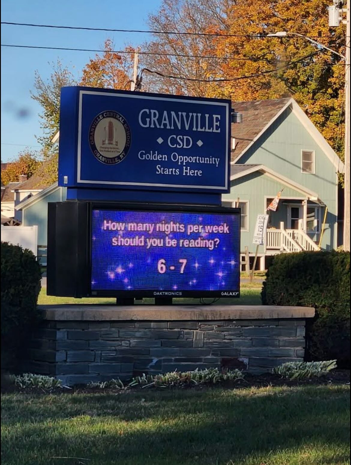 The outdoor digital school signage that reads: How many nights per week should you be reading? 6-7