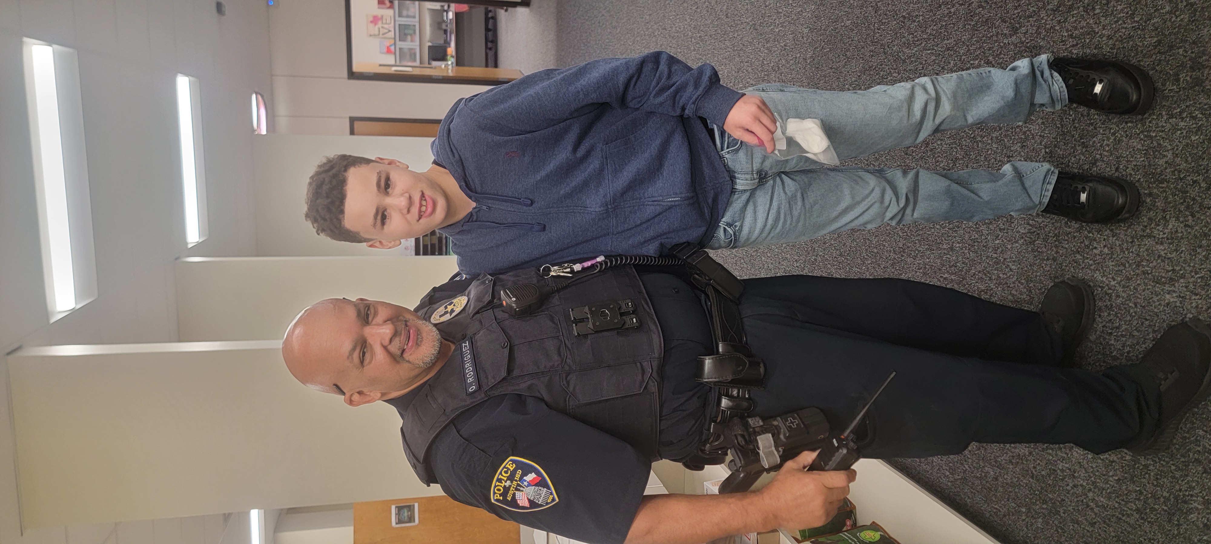 Officer Rodriguez and a student