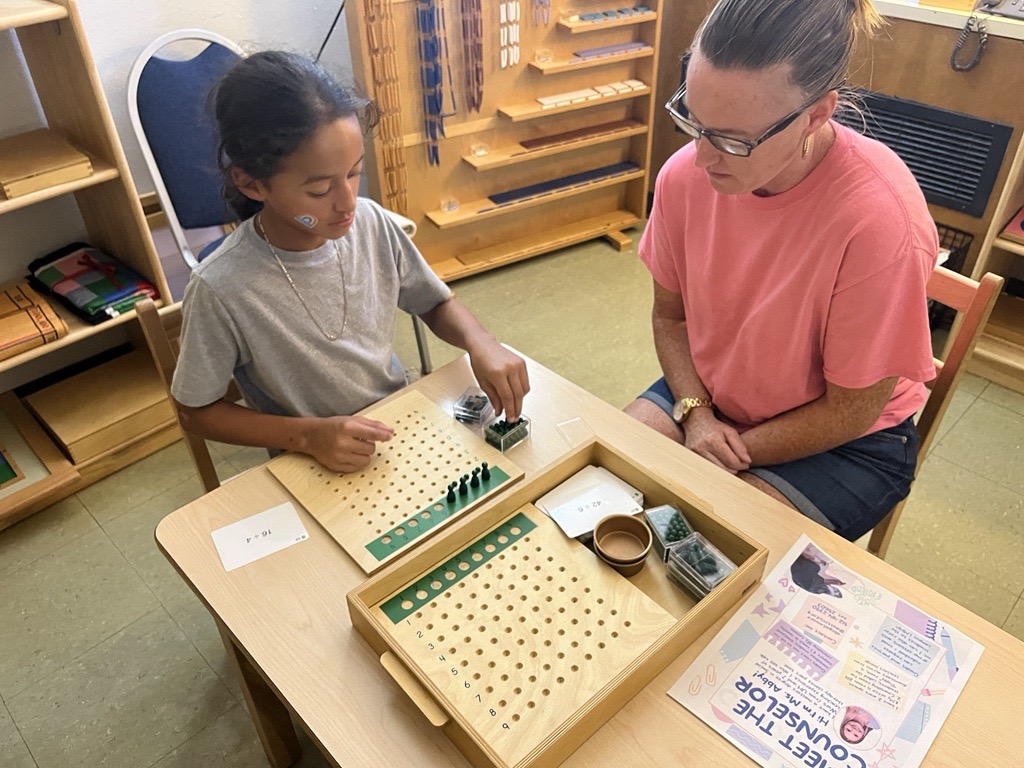 Son shows his mother math work