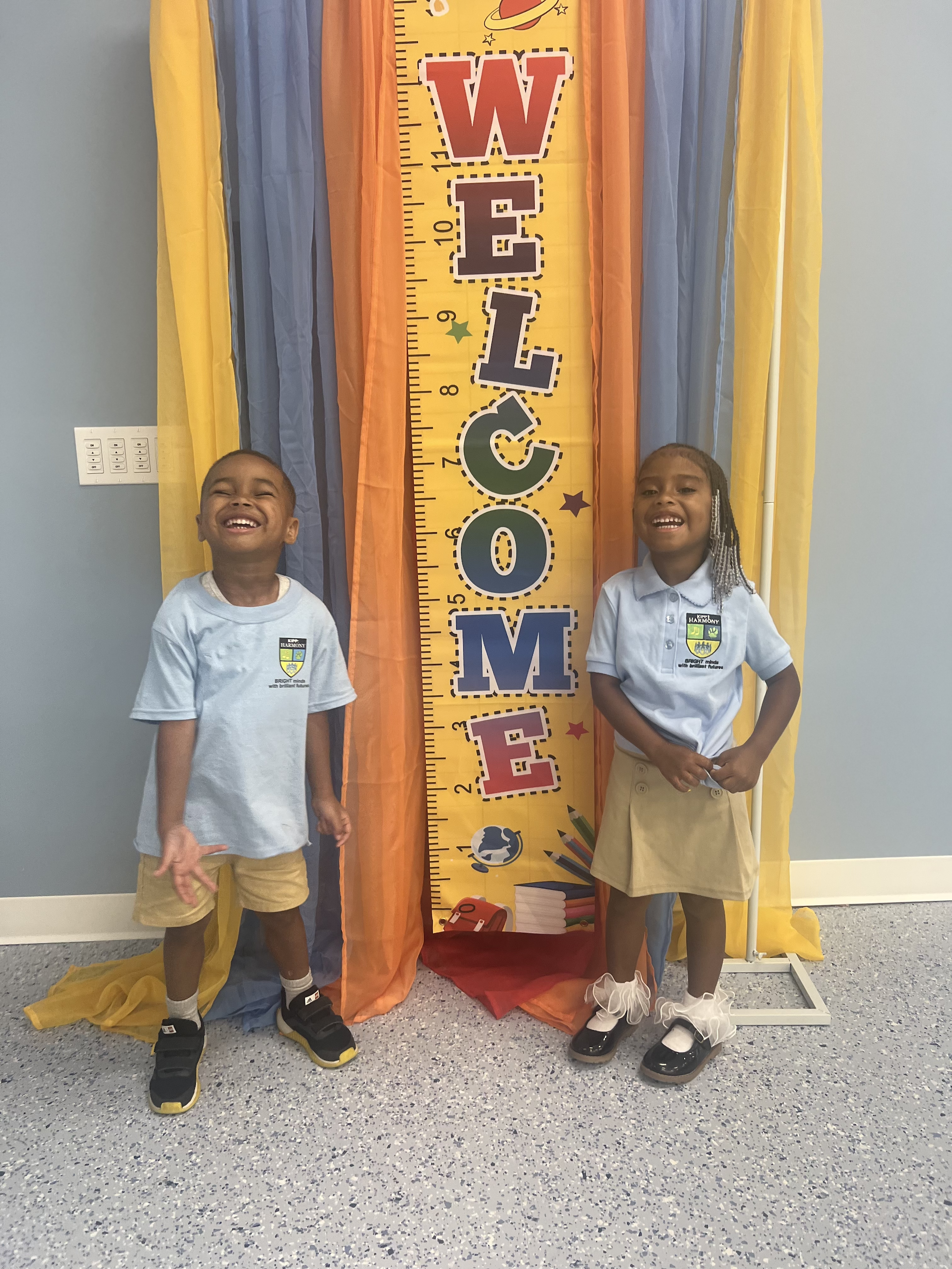 students with welcome sign