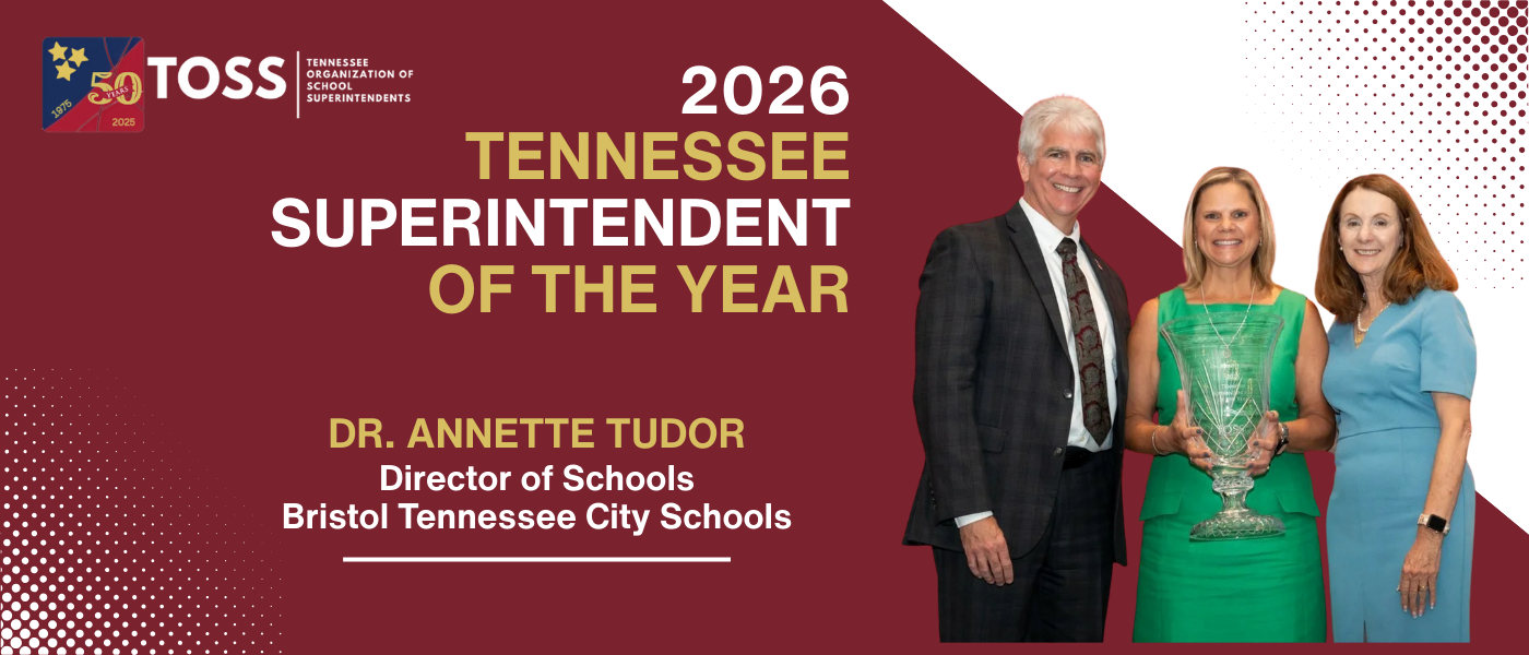 Graphic announcing the 2026 Tennessee Superintendent of the Year. The design features a maroon and white background with the Tennessee Organization of School Superintendents (TOSS) 50th anniversary logo in the top left corner. On the right, three people stand together smiling—Dr. Annette Tudor in a green dress holding a large glass trophy, with a man in a dark suit and a woman in a light blue dress beside her. Text reads: “2026 Tennessee Superintendent of the Year, Dr. Annette Tudor, Director of Schools, Bristol Tennessee City Schools.”