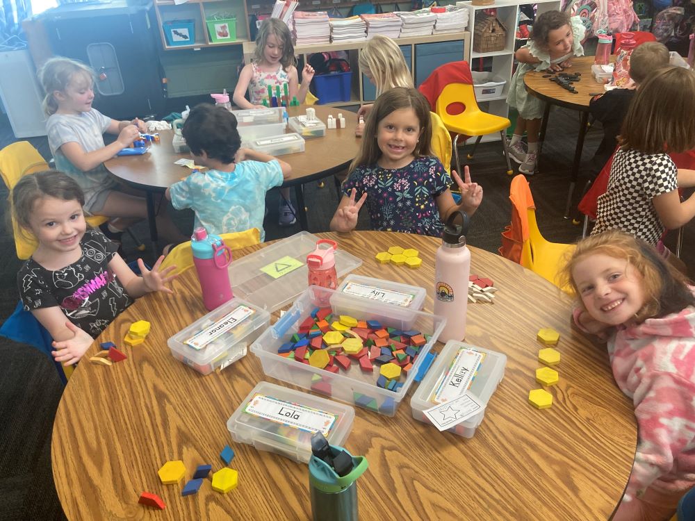 Kelley, Lily and Ella work with Unifix blocks
