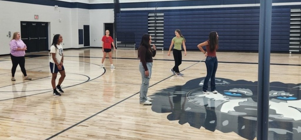 PE class playing volleyball