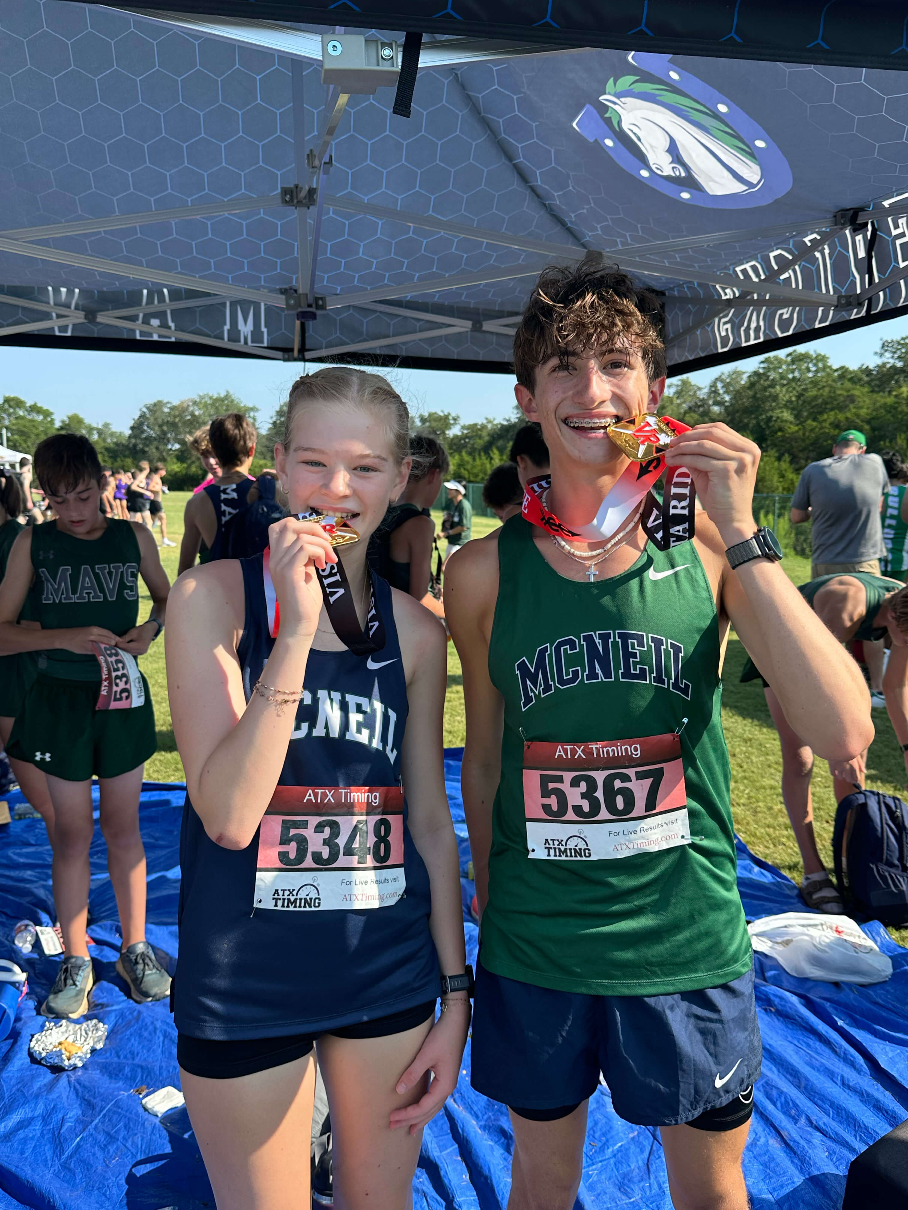 Justine Peterson and Noah Menchaca, Cross Country Medalists!