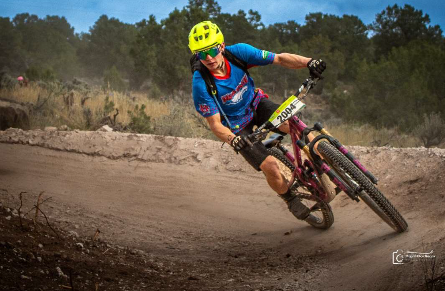 Heritage Student on Mountain Bike racing down hill
