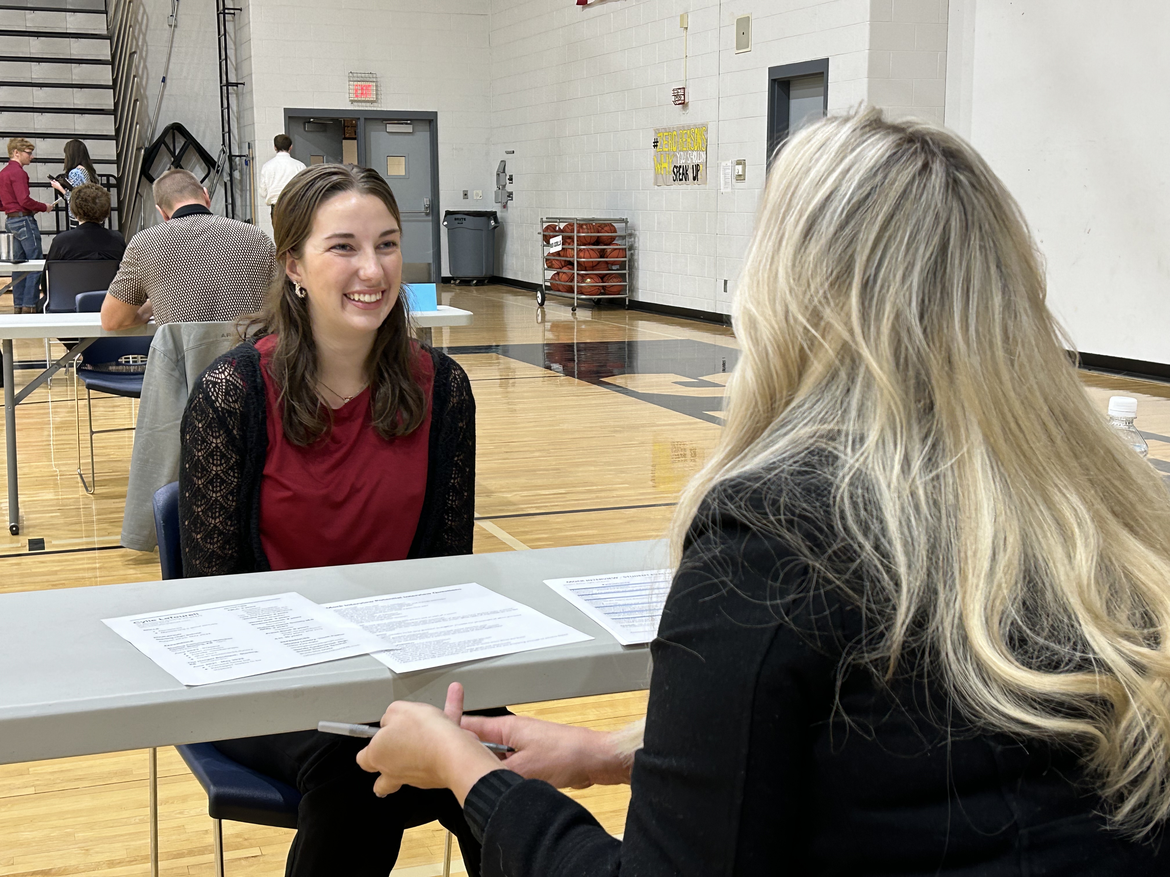 SHS Senior interviews with a community volunteer during Mock Interview Day