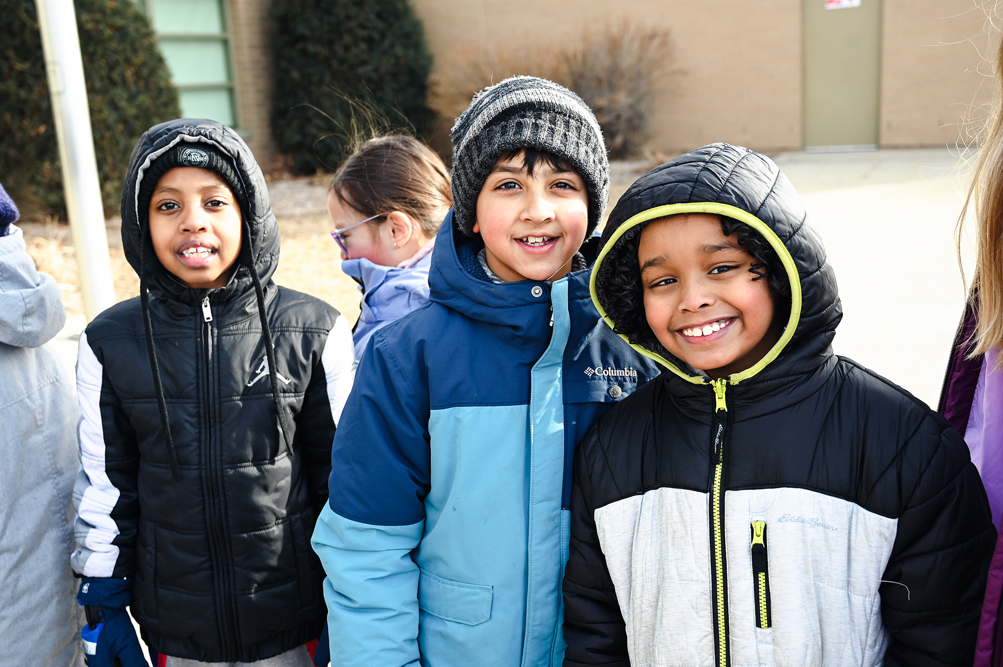 Students smiling at the camera