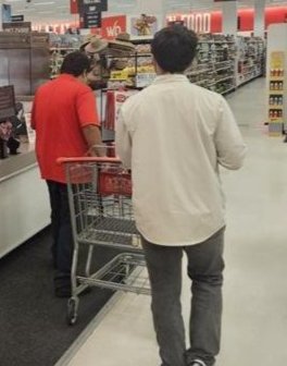 Aref getting assistance at Customer Service at the grocery store