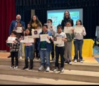 Two students practice yoga at Ellis Adventure day.