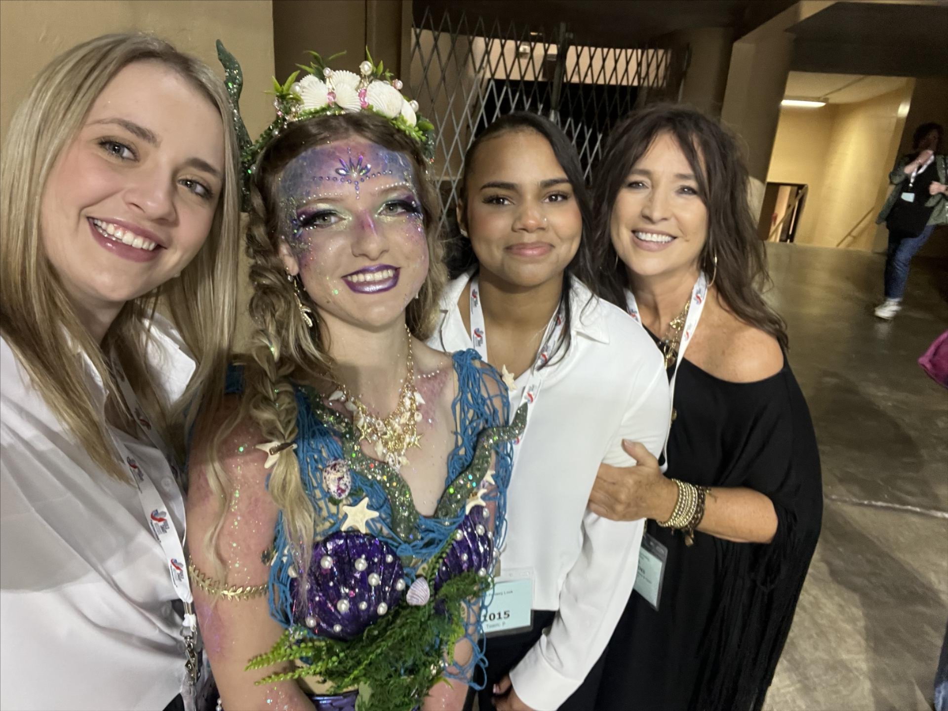 Students pose for a picture with instructor Jill Mullins, following their state championship in 