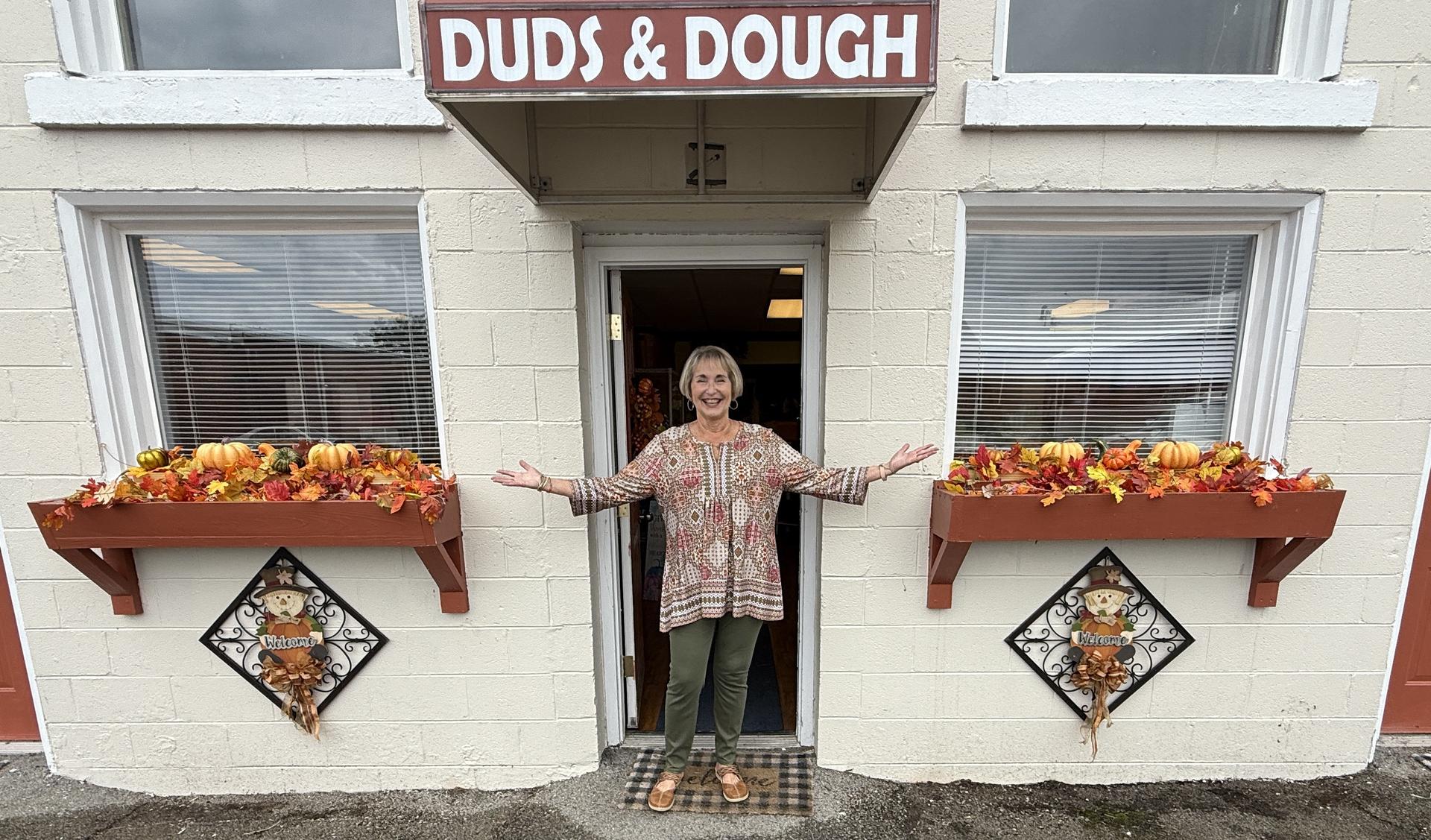 Pam Roberts stands in front of Duds & Dough
