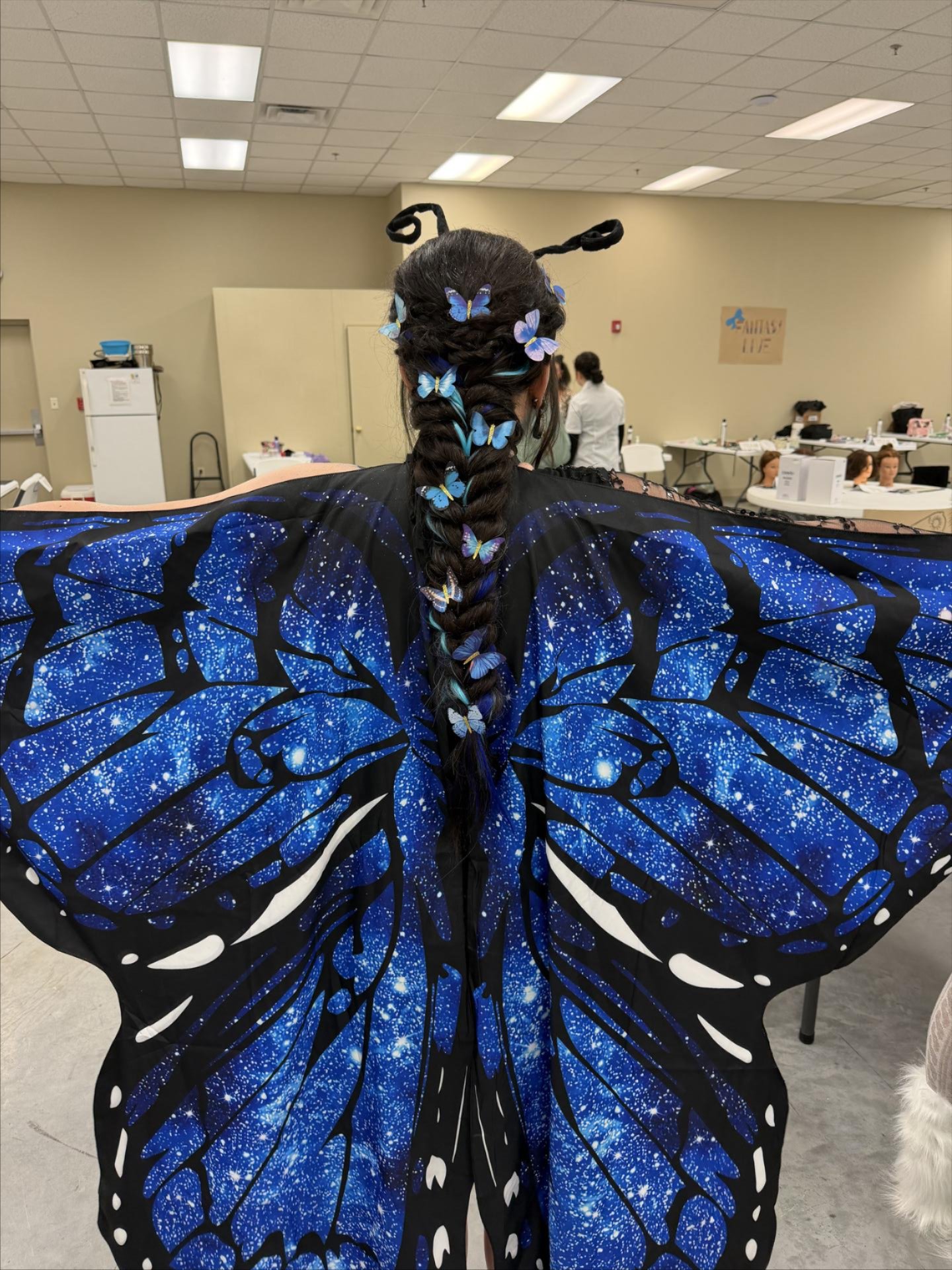Cosmetology students pose for a picture.