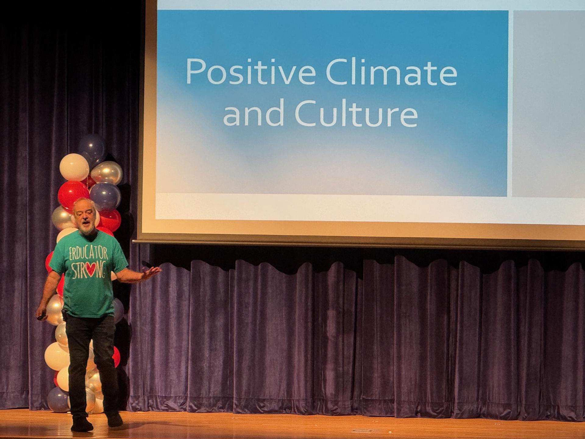 Mr. Brooks speaks to the audience on positivity and climate