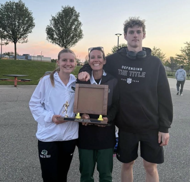 Coach Storey with son and daughter following winning the 2026 conference championship