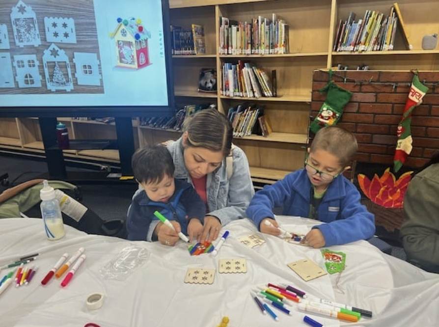 Families at Knapp's Early Literacy Workshop.