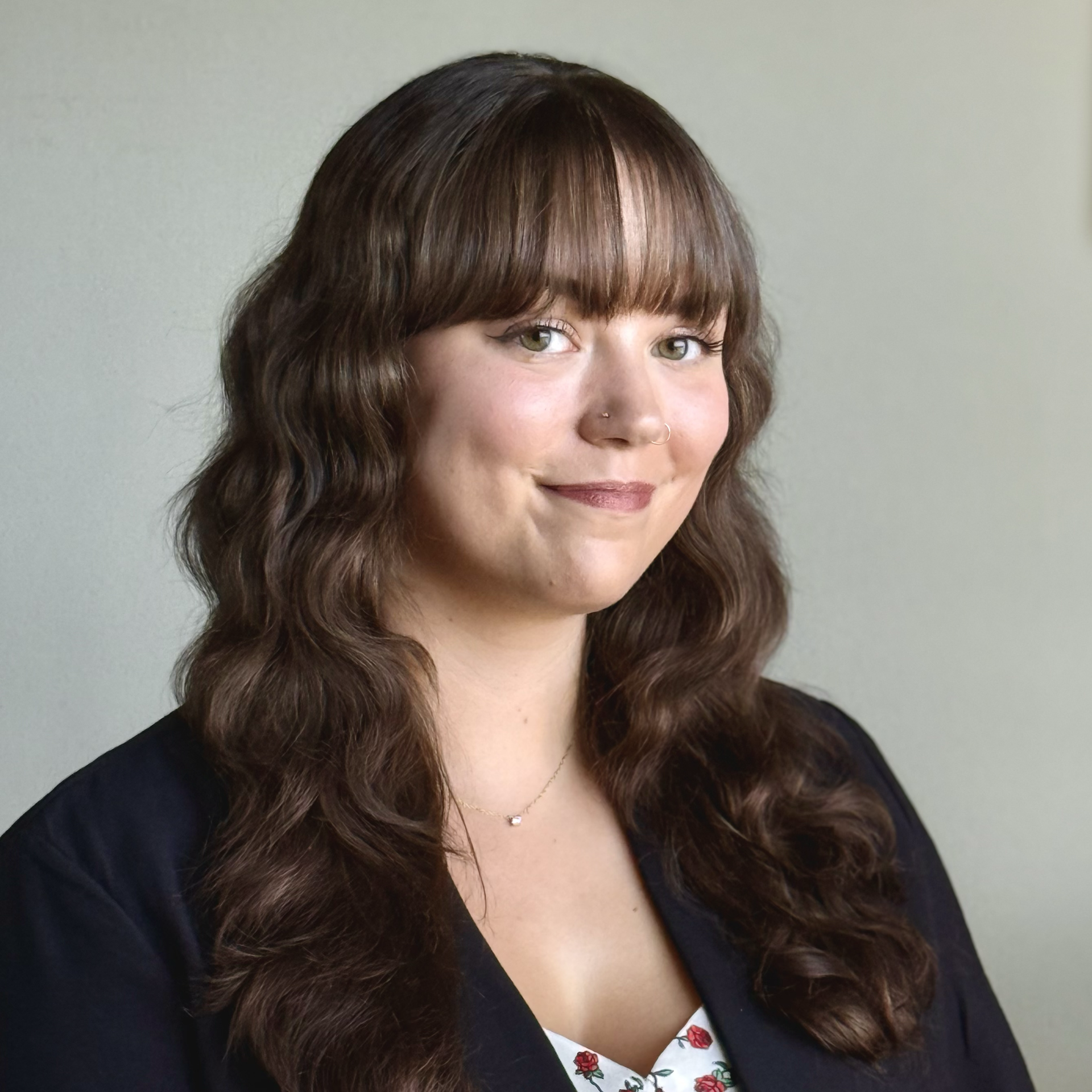 There is no text to transcribe in this photo—it is a headshot portrait of a woman.