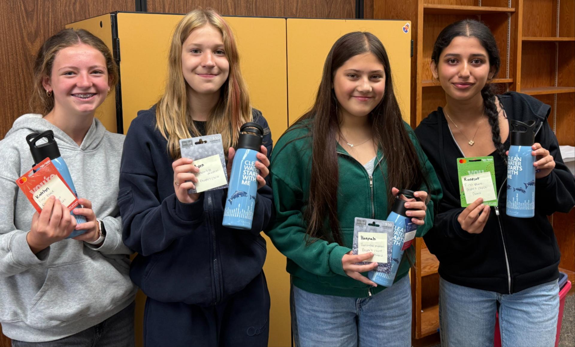 Laurin students display their prizes for their winning videos