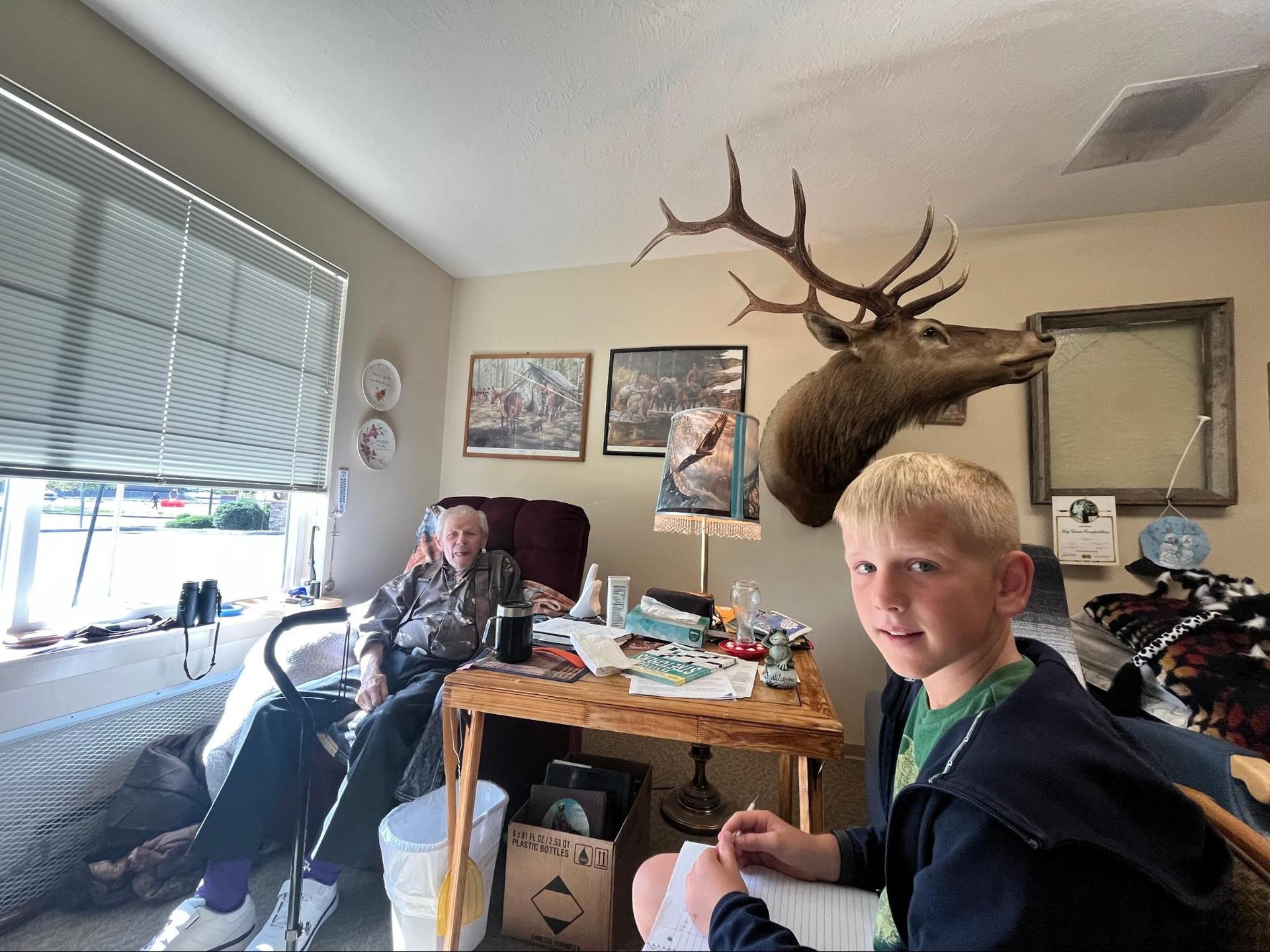 6th graders interviewing residents at the Wallowa Valley Senior Living Center