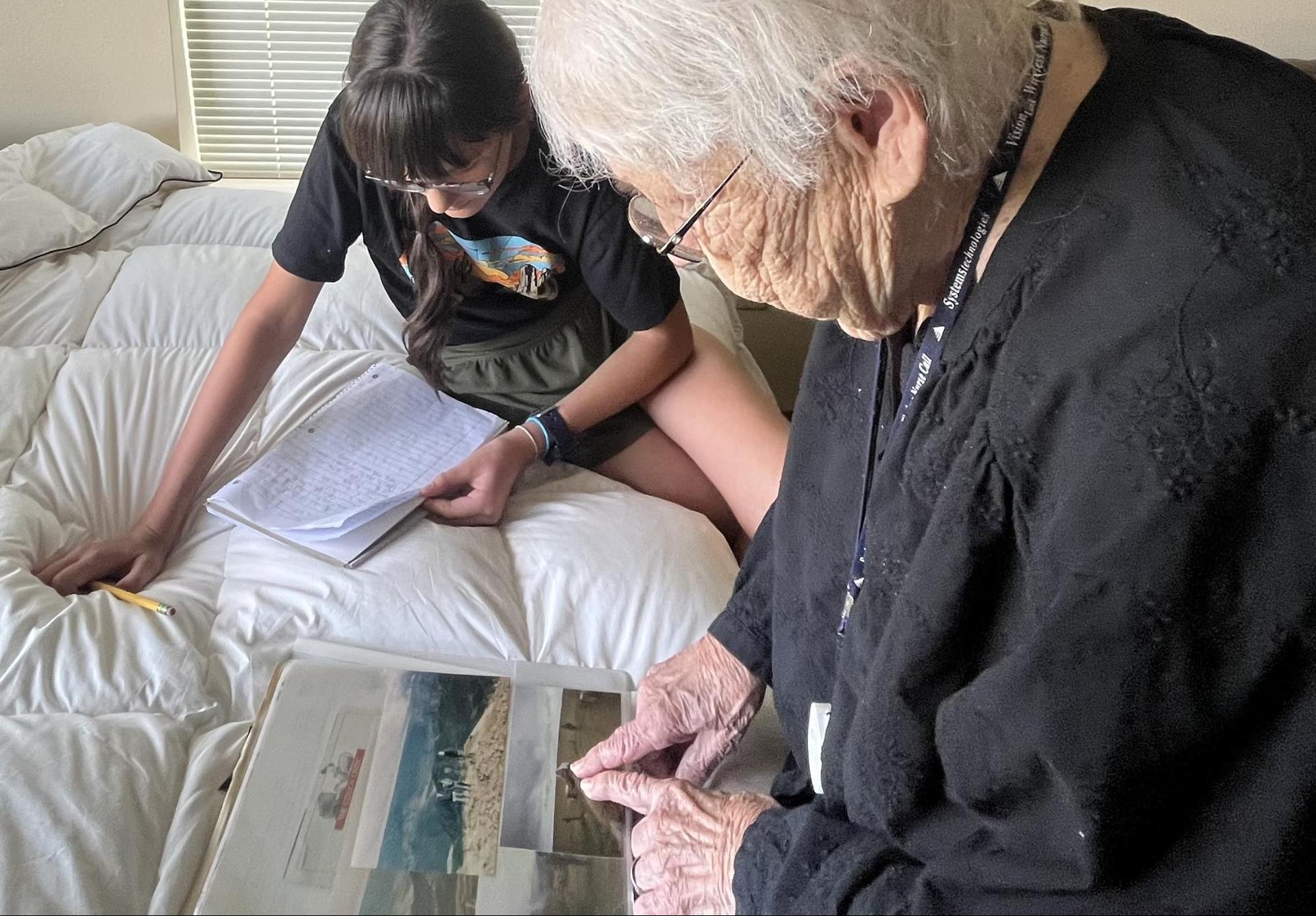 6th graders interviewing residents at the Wallowa Valley Senior Living Center