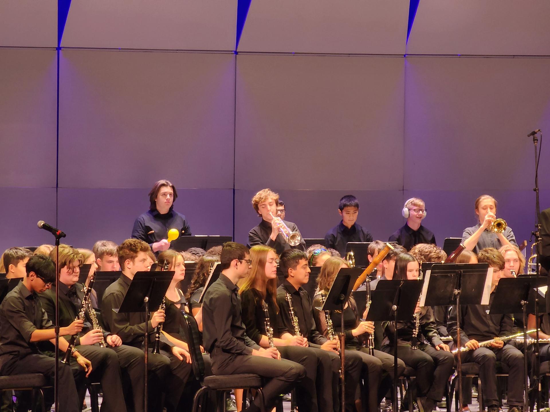 Three RCS students on stage at Proctors Theatre, Schenectady