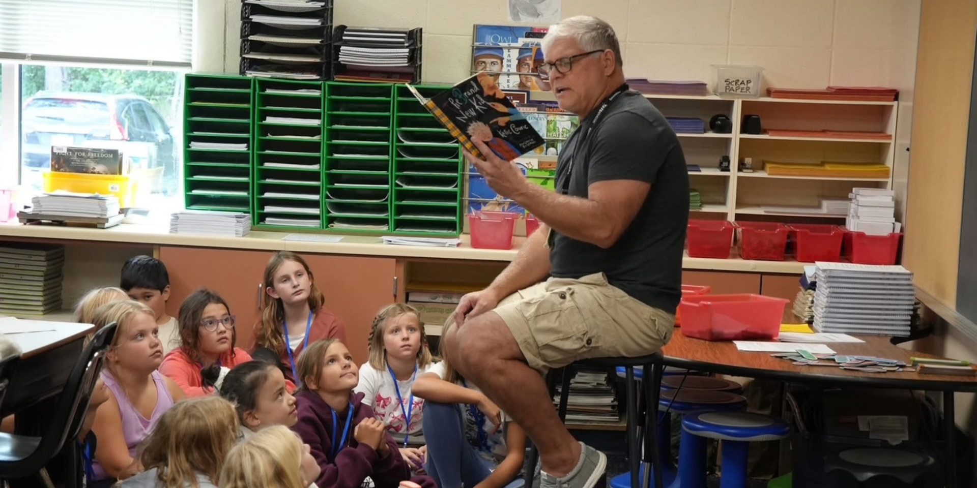 Teacher with students