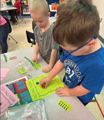 Kindergarten students playing a math game