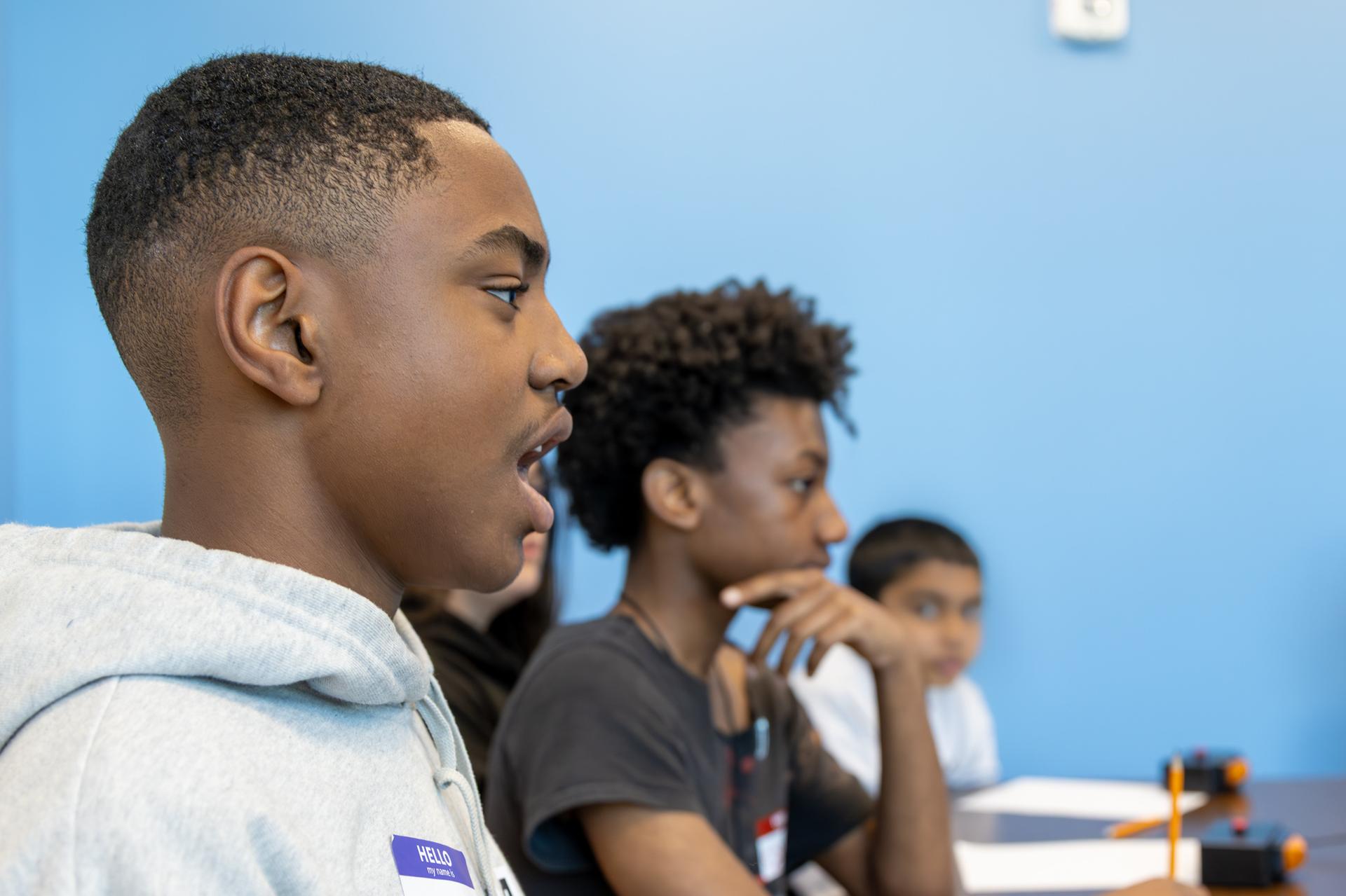 2 male students looking surprised 