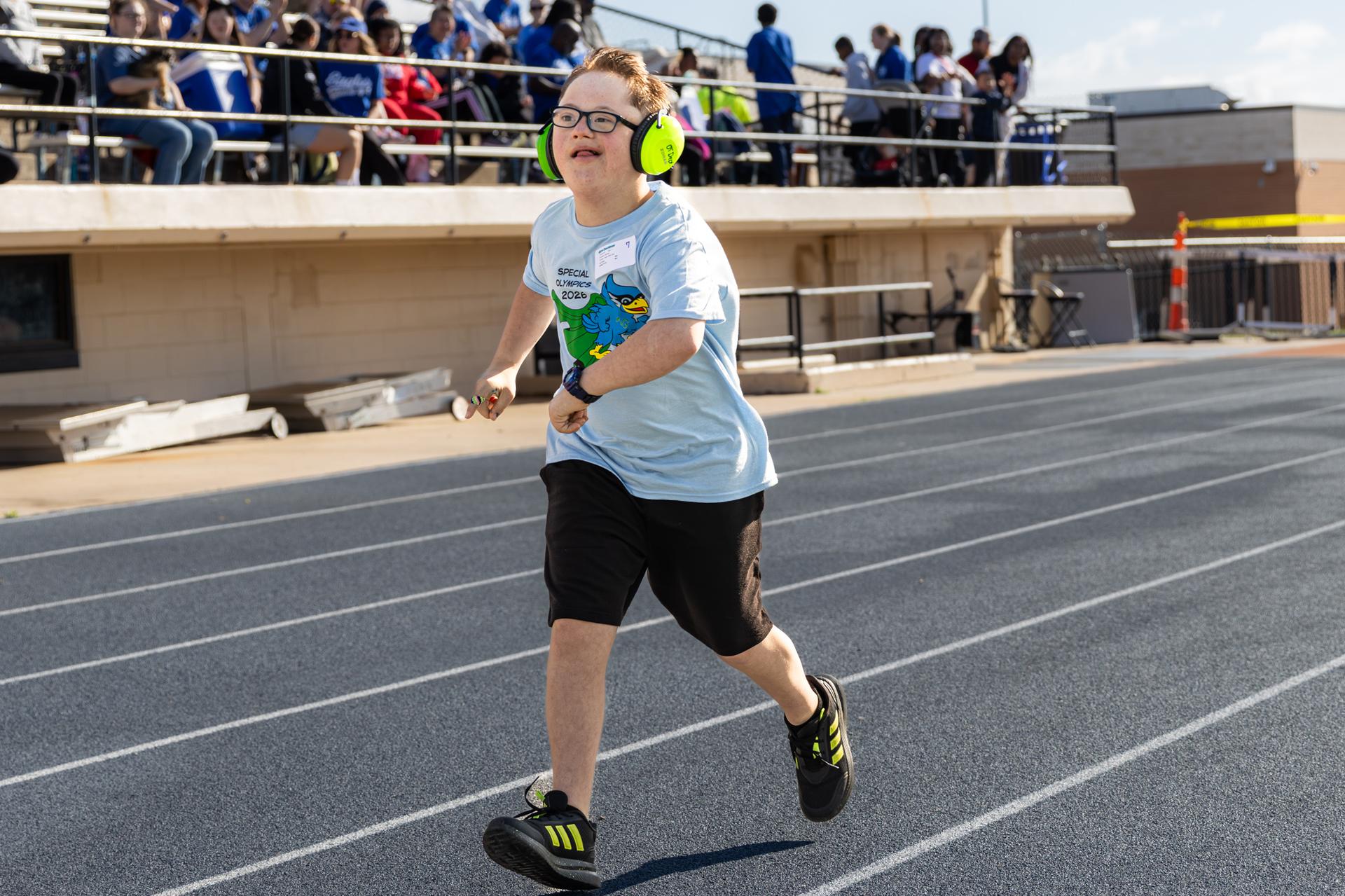 student running on the track