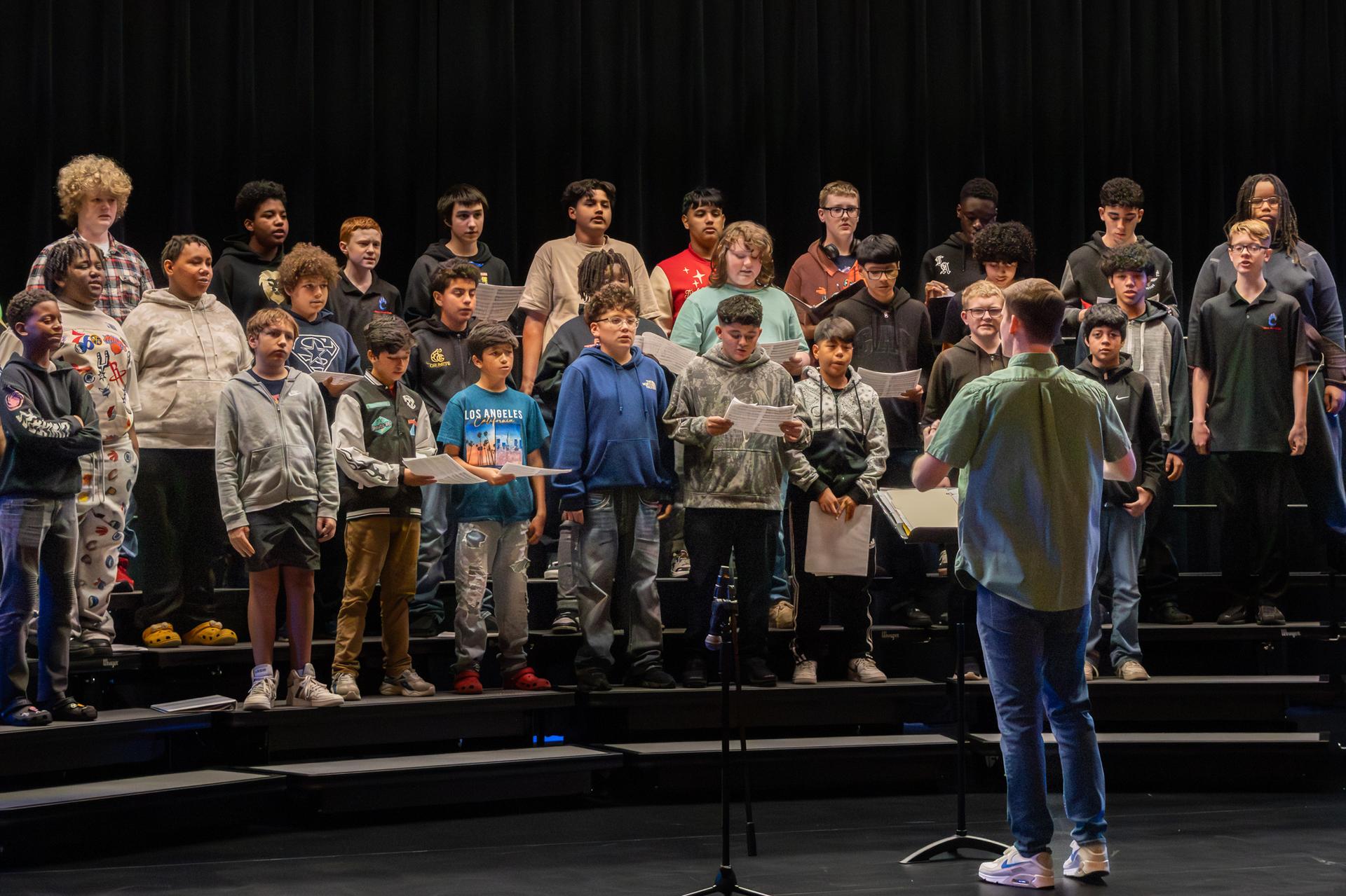 male students singing